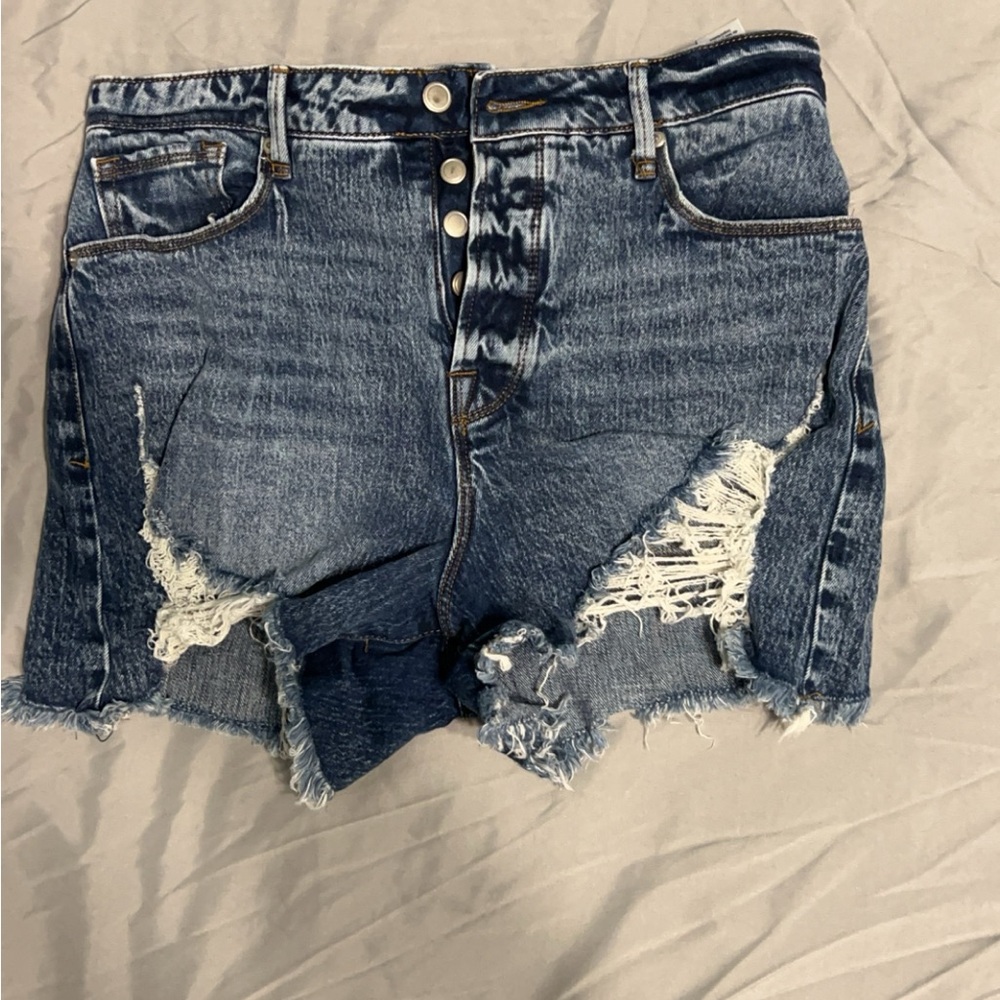 Good American bombshell high waisted jean shorts.